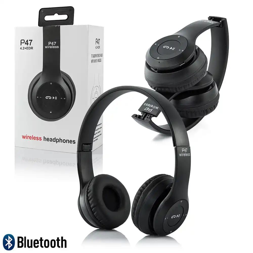 Black wireless headphones with Bluetooth logo next to their packaging on a white background